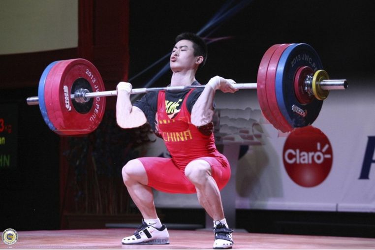 Штанга DHS Olympic для соревнований 140 кг (IWF) L220 см D50мм фото 2
